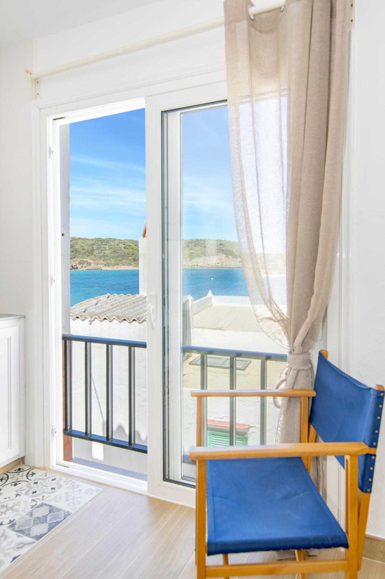 Fantástico apartamento en primera línea de mar en Menorca Es Grau Esterno foto