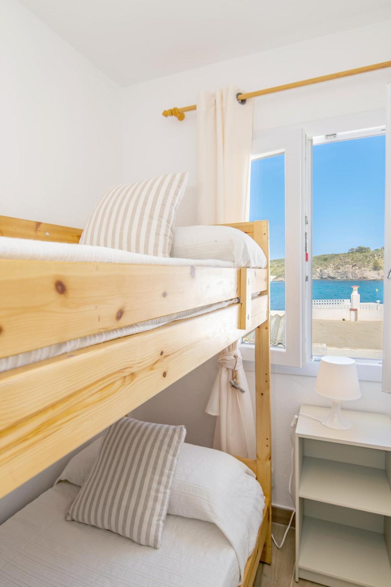 Fantástico apartamento en primera línea de mar en Menorca Es Grau Esterno foto
