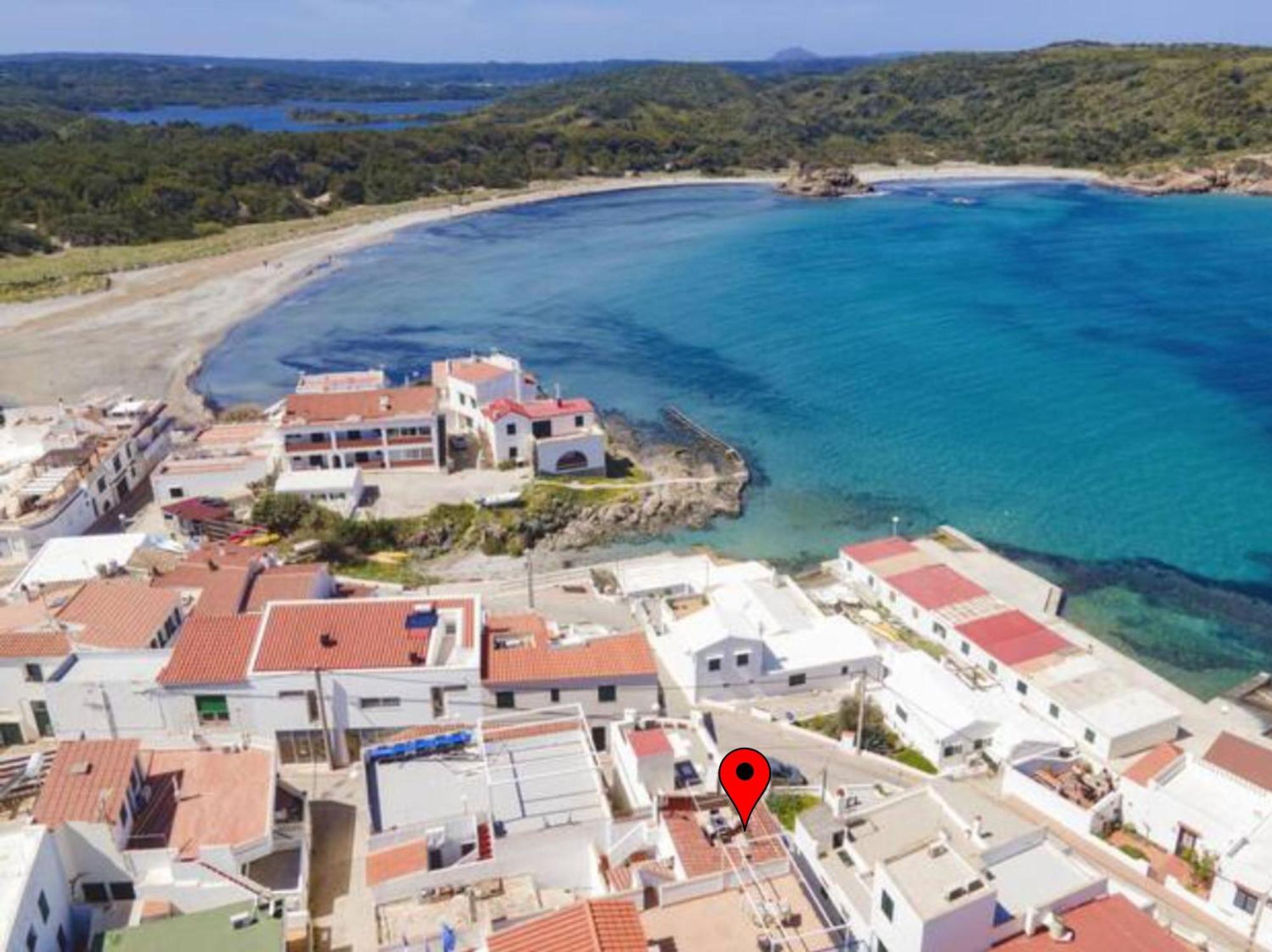 Fantástico apartamento en primera línea de mar en Menorca Es Grau Esterno foto